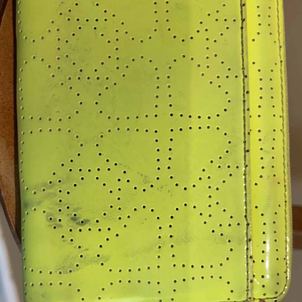 A Beautiful Line green wallet with a few spots. - Picture 3 of 3